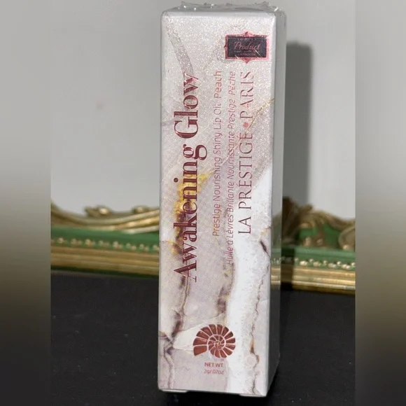 Awakening Glow Peach Lip Oil - Retail $120